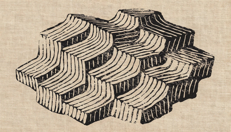 One large geometric stamped motif in black ink on warm linen, set off center with plain space around it