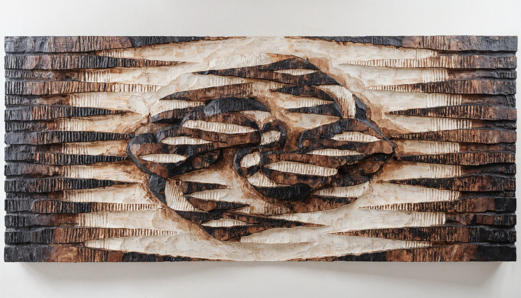 Relief print of repeated carved geometric shapes across a wide band, thickening at one point into an abstract mask form