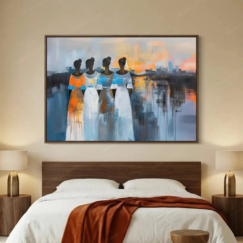 African American art for bedroom, walnut framed sunset painting above a bed with white linens and a rust throw