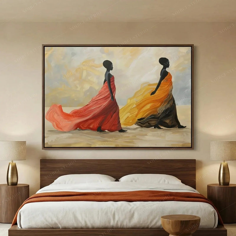 African American bedroom art, framed gown painting above a walnut bed with a burnt orange throw and gold lamps