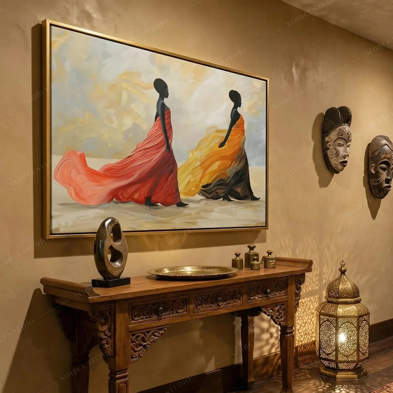African wall decor in a warm hallway, gold framed gown painting beside carved masks and a glowing Moroccan lantern
