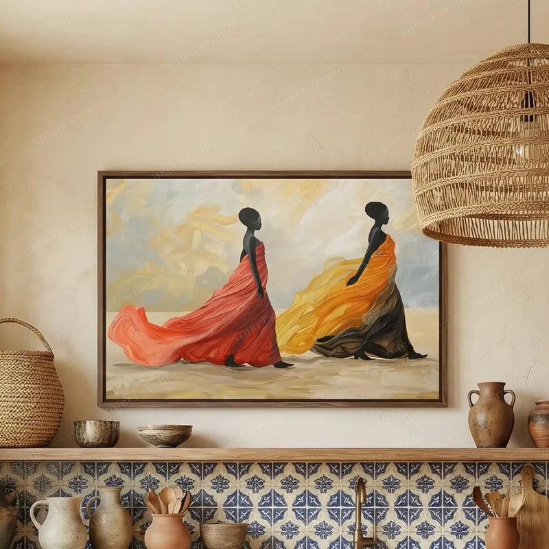 African art canvas print in a walnut frame above blue patterned tile and clay pottery in a warm plaster kitchen