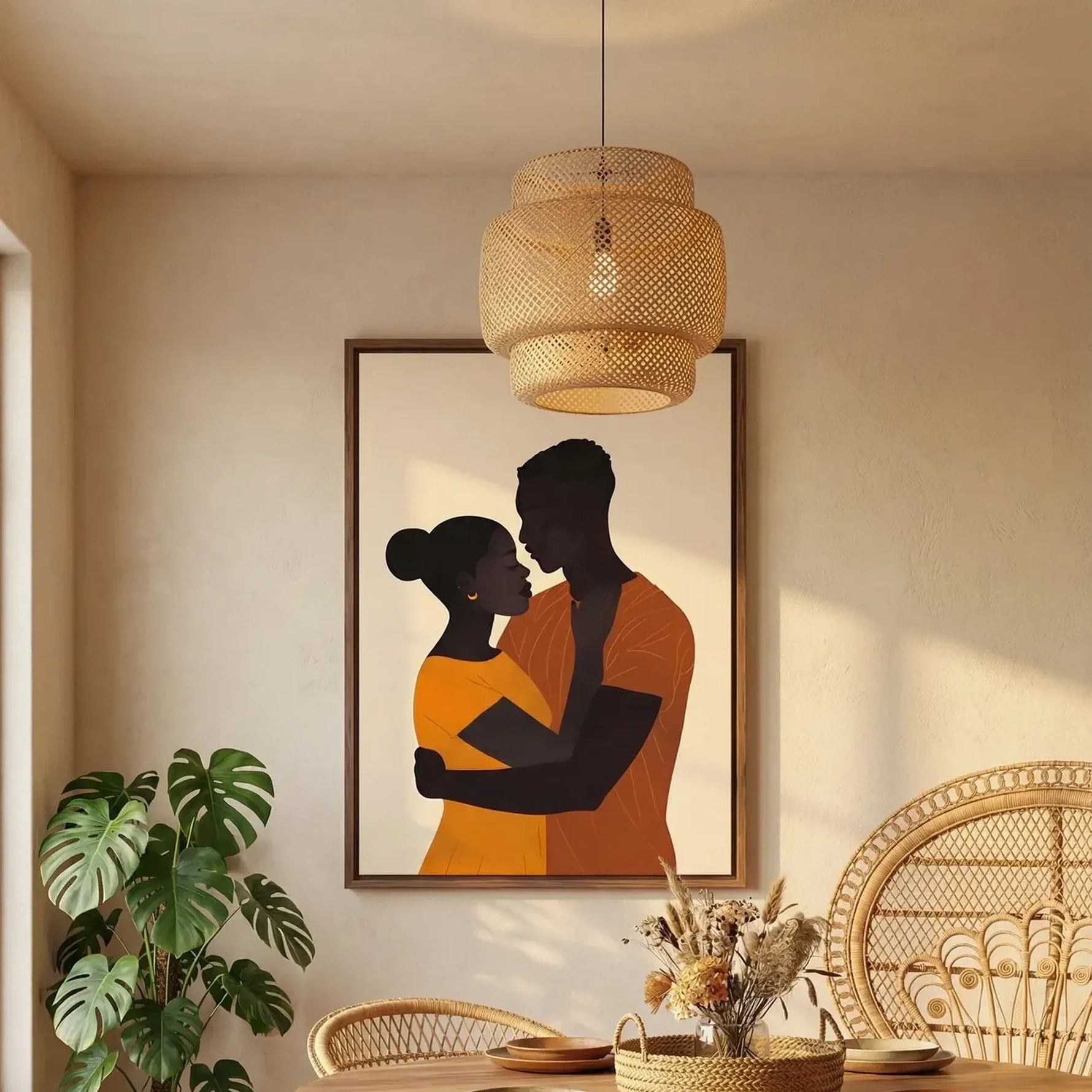 African American dining room art, couple embrace canvas under a rattan pendant beside a monstera in a boho dining room