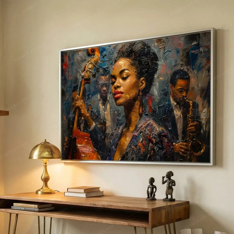 Black home office art, young jazz vocalist painting above a wood desk with a brass mushroom lamp and figurines