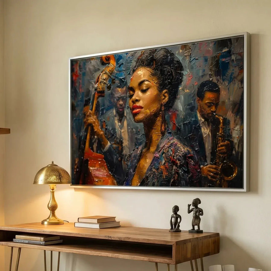 Black home office art, young jazz vocalist painting above a wood desk with a brass mushroom lamp and figurines