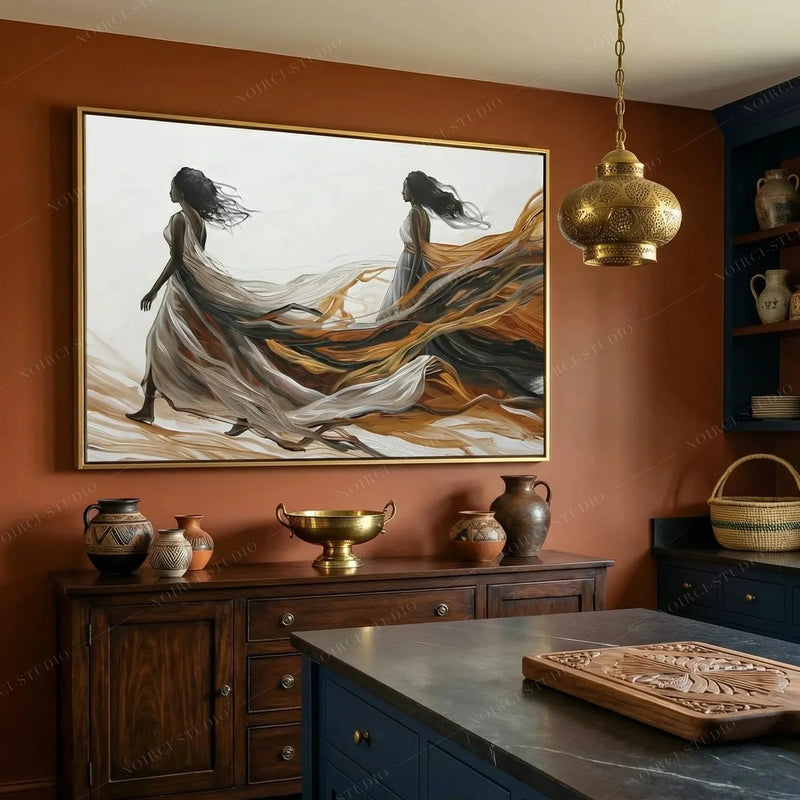 Black kitchen wall art, women in billowing dresses above a dark wood sideboard on a rust orange wall