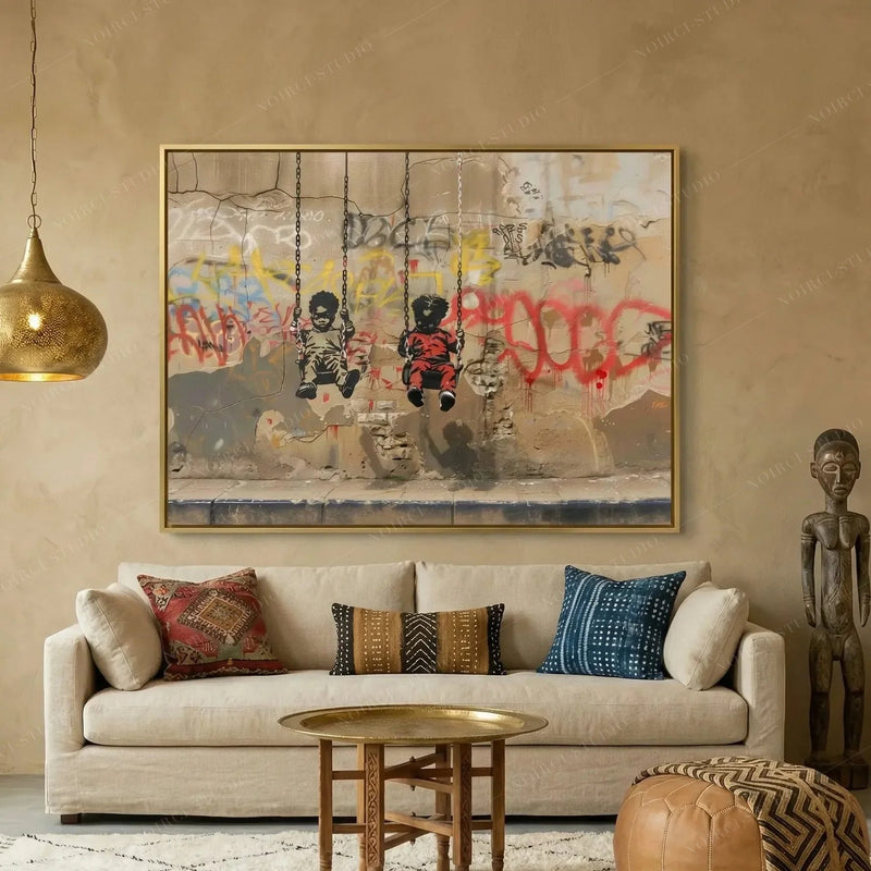 Afrohemian decor, graffiti swings canvas in a gold frame above a linen sofa with mudcloth and kilim pillows