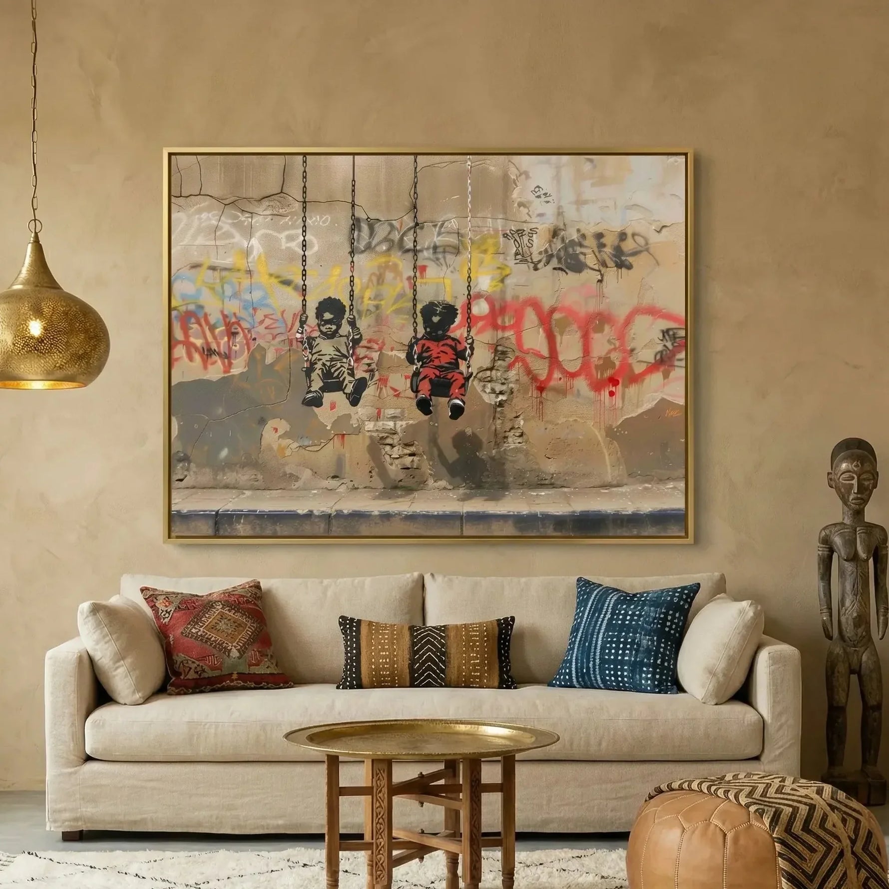 Afrohemian decor, graffiti swings canvas in a gold frame above a linen sofa with mudcloth and kilim pillows