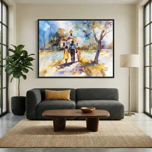 African American wall art above a charcoal sofa, chapel scene in a black frame beside a fiddle leaf fig