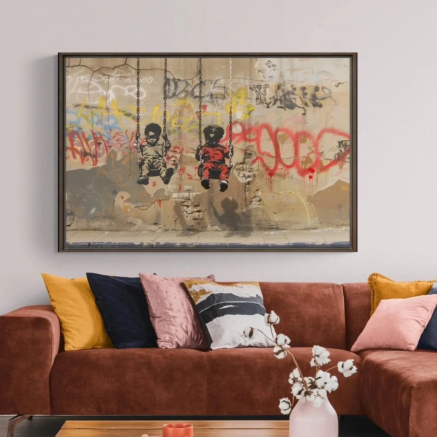 Graffiti kids canvas in a walnut frame above a rust sectional with blush and mustard pillows in a warm living room