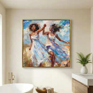 Black bathroom wall art above a freestanding tub, gold-framed painting of women twirling in white dresses