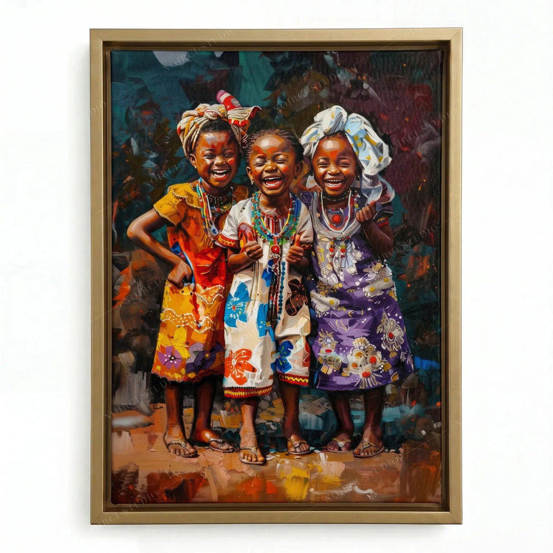 African canvas wall art in a gold floating frame, three girls giggling together in orange, white and purple dresses