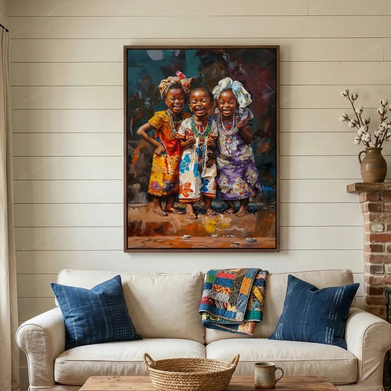 Black art for living room, laughing girls painting above a linen sofa with navy pillows and white shiplap walls