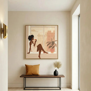 Black art for an entryway, wine at the window print above a walnut bench with a mustard pillow and brass sconce