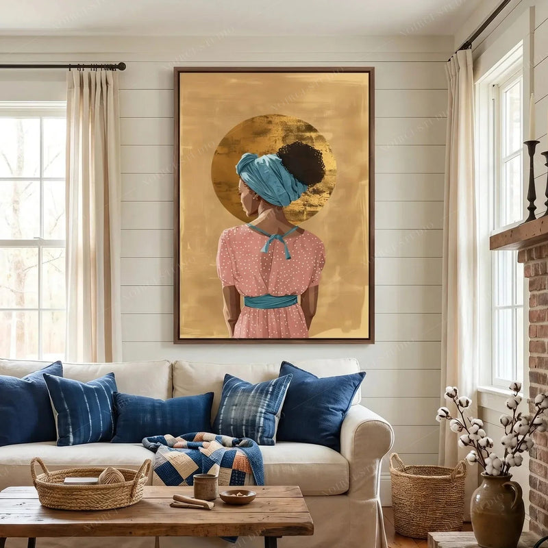 Black art for living room in a farmhouse room with shiplap, brick fireplace and blue pillows, gold halo headwrap art
