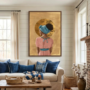 Black art for living room in a farmhouse room with shiplap, brick fireplace and blue pillows, gold halo headwrap art