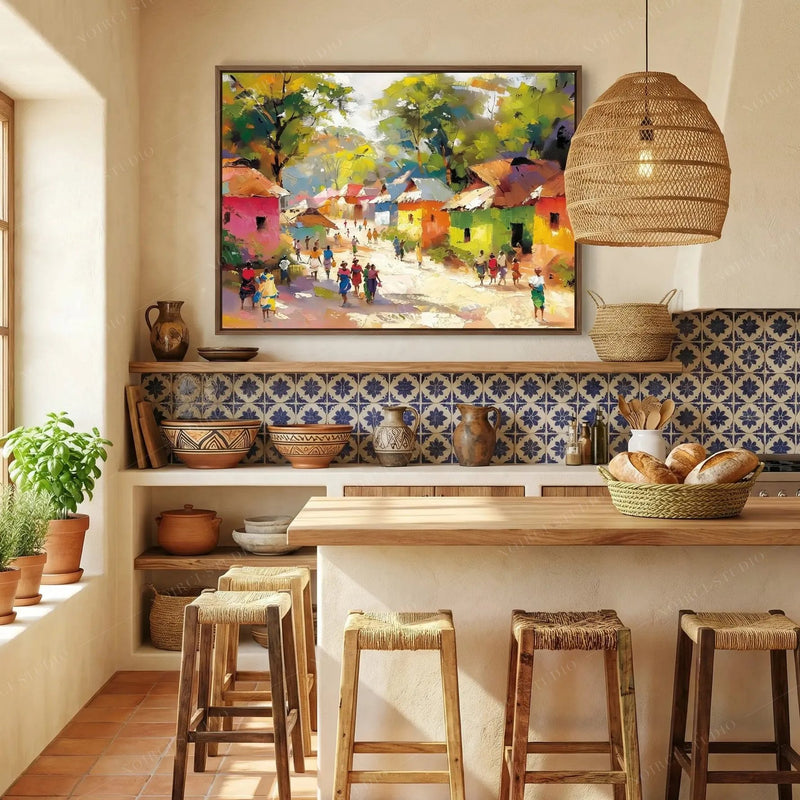 Black kitchen wall art, village painting in a walnut frame above blue patterned tile and rattan pendant lights
