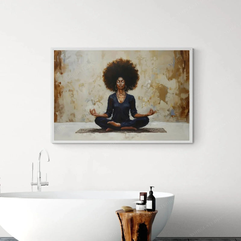 Black bathroom wall art, lotus meditation painting in a white frame behind a freestanding tub
