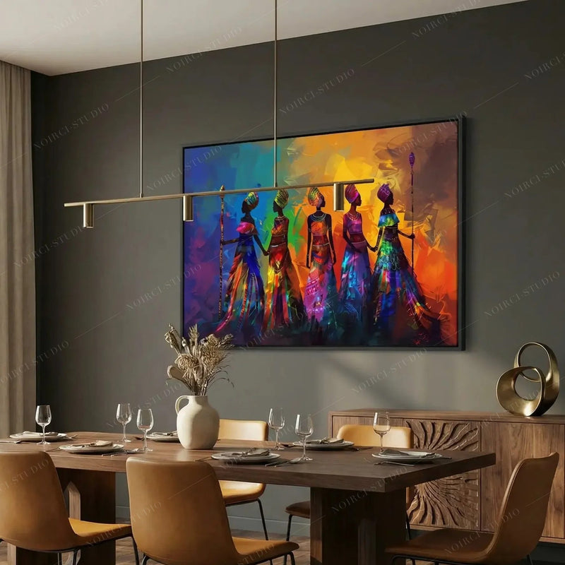 Black framed African women painting in a modern dining room with walnut table and cognac leather chairs
