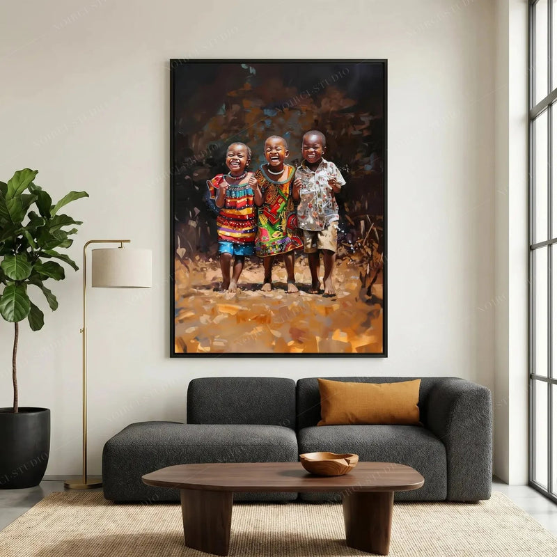 African wall art in a black frame above a charcoal sofa, oil painting of three laughing children in colorful patterned prints