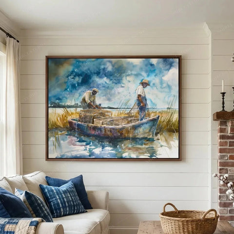 Gullah Geechee wall art above a cream sofa with indigo pillows, two crabbers hauling crab pots in a marsh boat