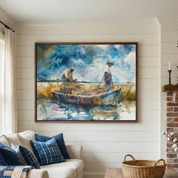 Gullah Geechee wall art above a cream sofa with indigo pillows, two crabbers hauling crab pots in a marsh boat