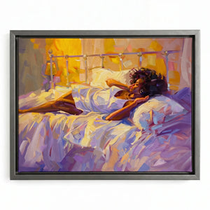 Modern melanin wall art in a silver floating frame, woman waking slowly in warm yellow light