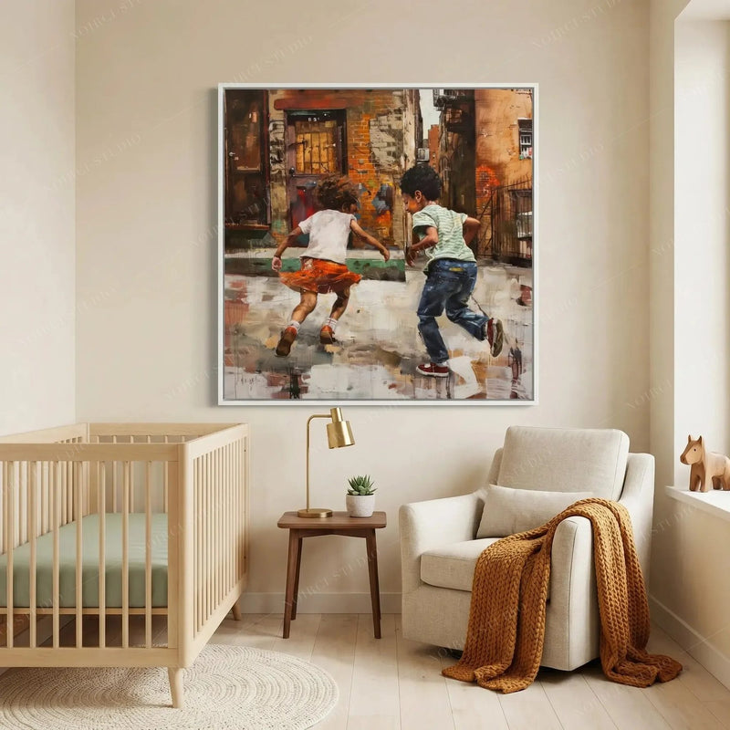 Black art for nursery walls, white framed alley scene above a light wood crib and boucle armchair with mustard throw