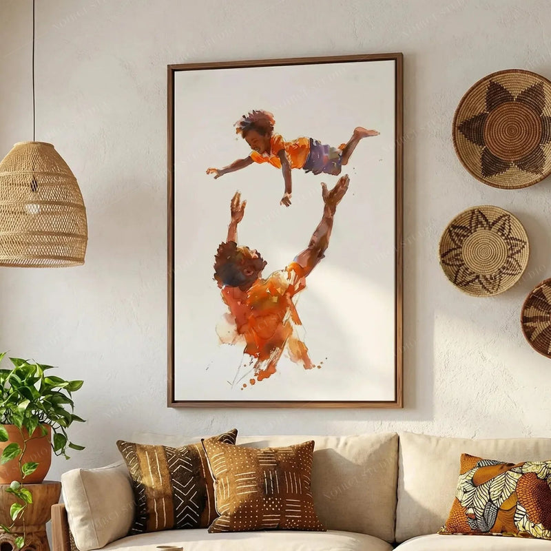 Afrohemian decor, father tossing son canvas in a walnut frame between woven wall baskets and mudcloth pillows