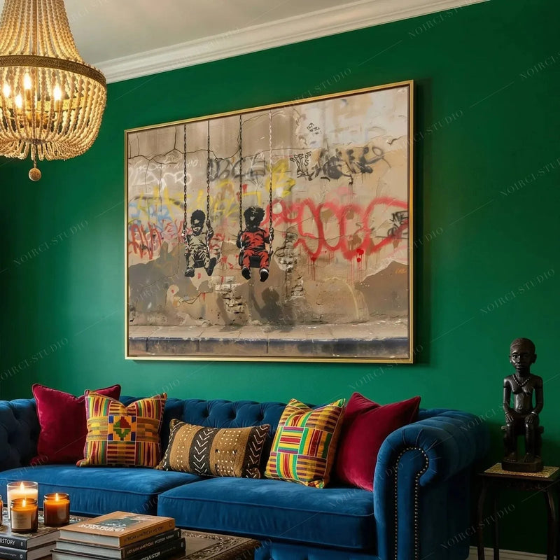 Black art for living room, swings graffiti in a gold frame above a blue velvet sofa with kente pillows on a green wall