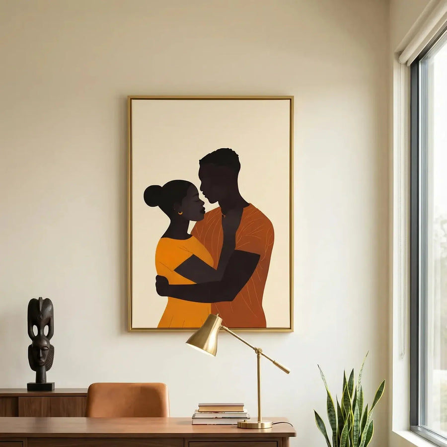 African American art for a home office, gold-framed couple embrace above a walnut desk and carved ebony statue