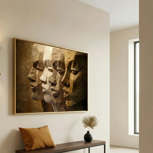 African American art for an entryway, gold-framed paper-craft men profiles above a bench with a mustard cushion