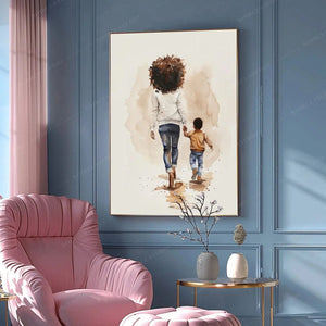 Black art for a bedroom reading nook, pink armchair against blue paneled walls, gold-framed mother and son watercolor