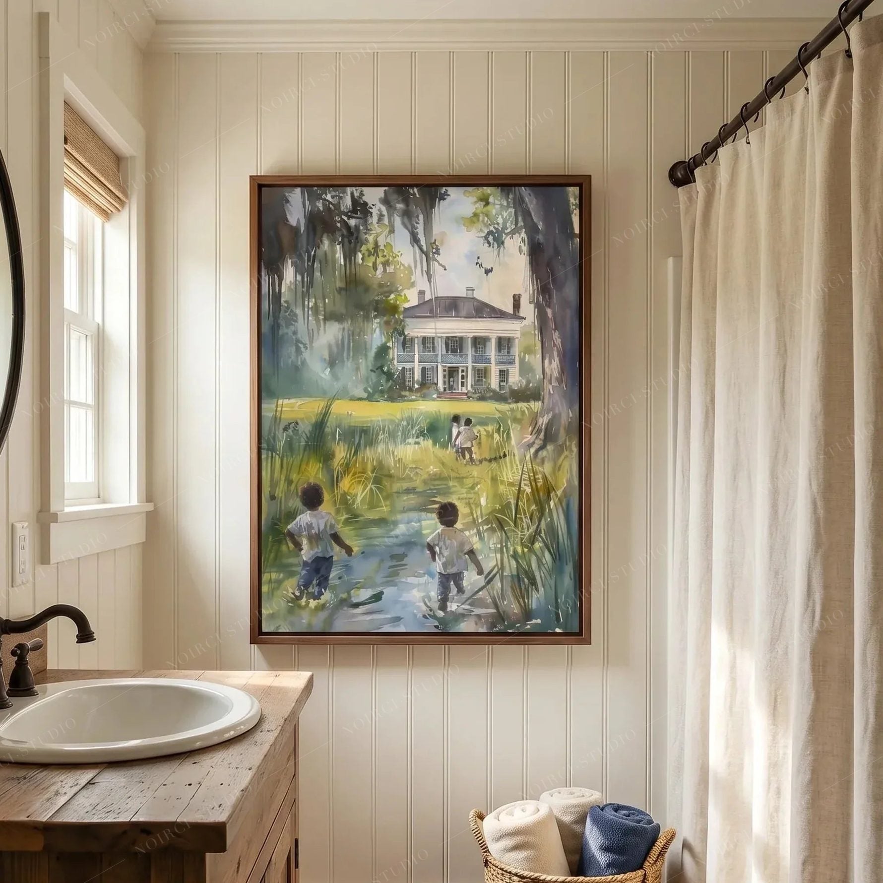 Black bathroom wall art, lowcountry watercolor above a beadboard wall beside a wood vanity and linen curtain