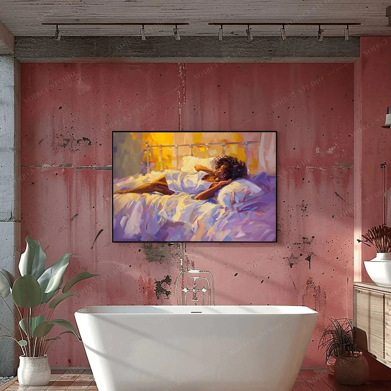 Black bathroom wall art, morning light painting in a black frame above a freestanding tub and coral concrete wall
