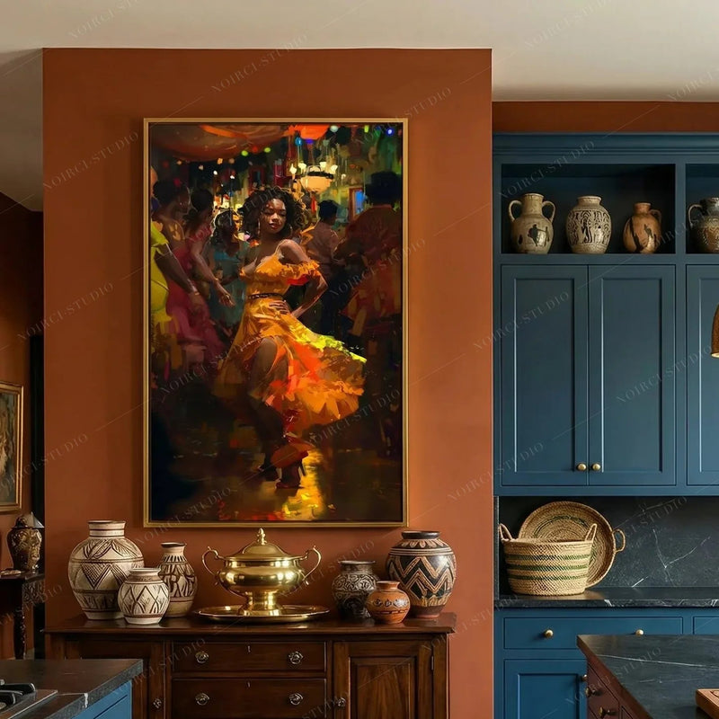 Black kitchen wall art, salsa dancer in a gold frame on a terracotta wall beside navy blue cabinets
