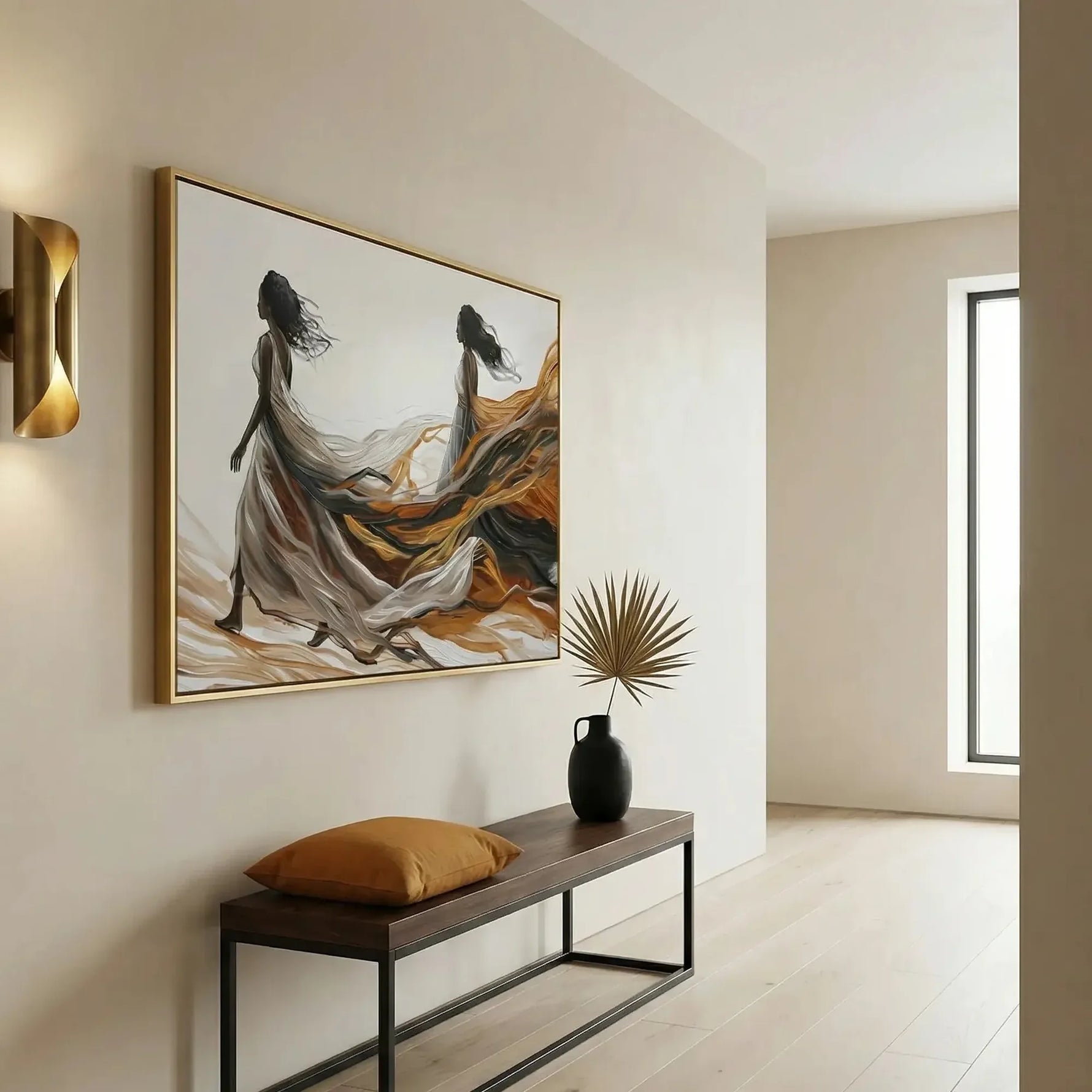 Modern Black art in a bright hallway, two women with sweeping amber trains above a dark bench with a mustard pillow