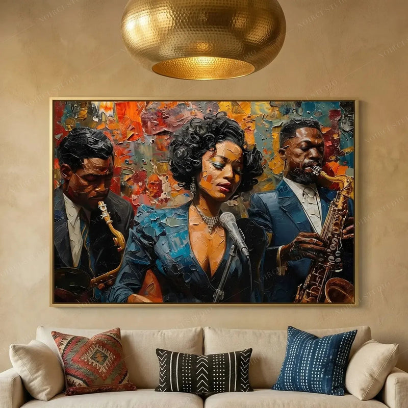 Black art for living room decor, jazz trio painting on a plaster wall above a cream sofa with kilim pillows