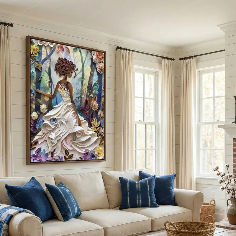 Black art for living room, quilled girl in a white gown framed above a cream sofa with navy pillows