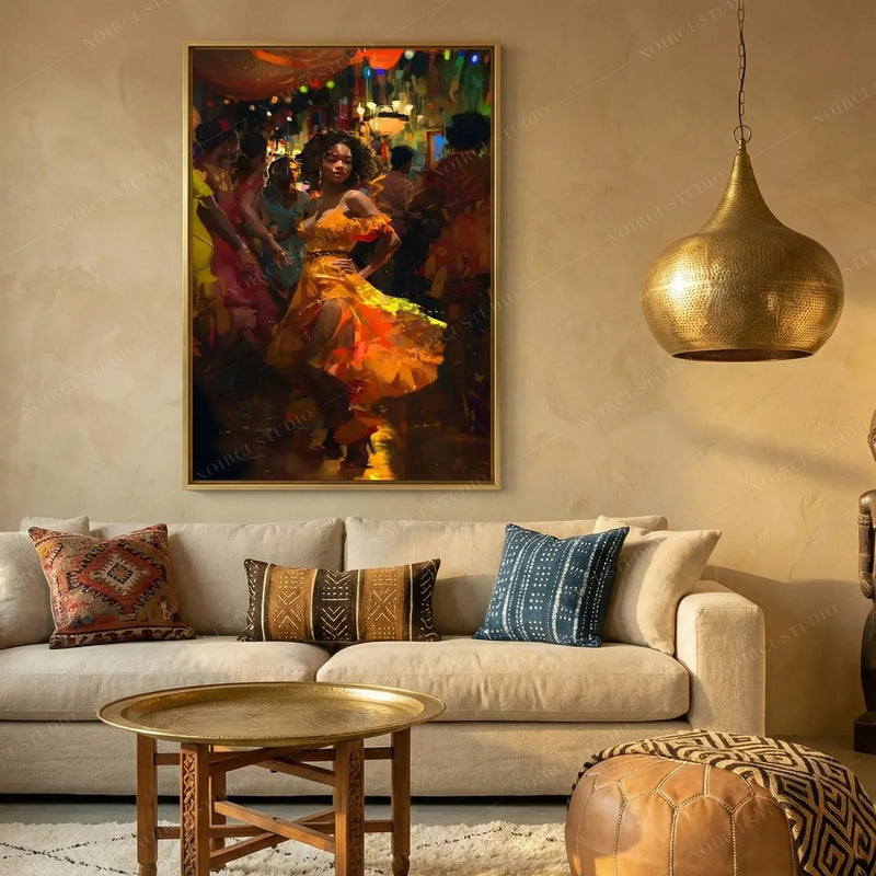 Afrohemian decor, salsa dancer in a gold frame above a cream sofa with indigo mudcloth pillows and a brass pendant