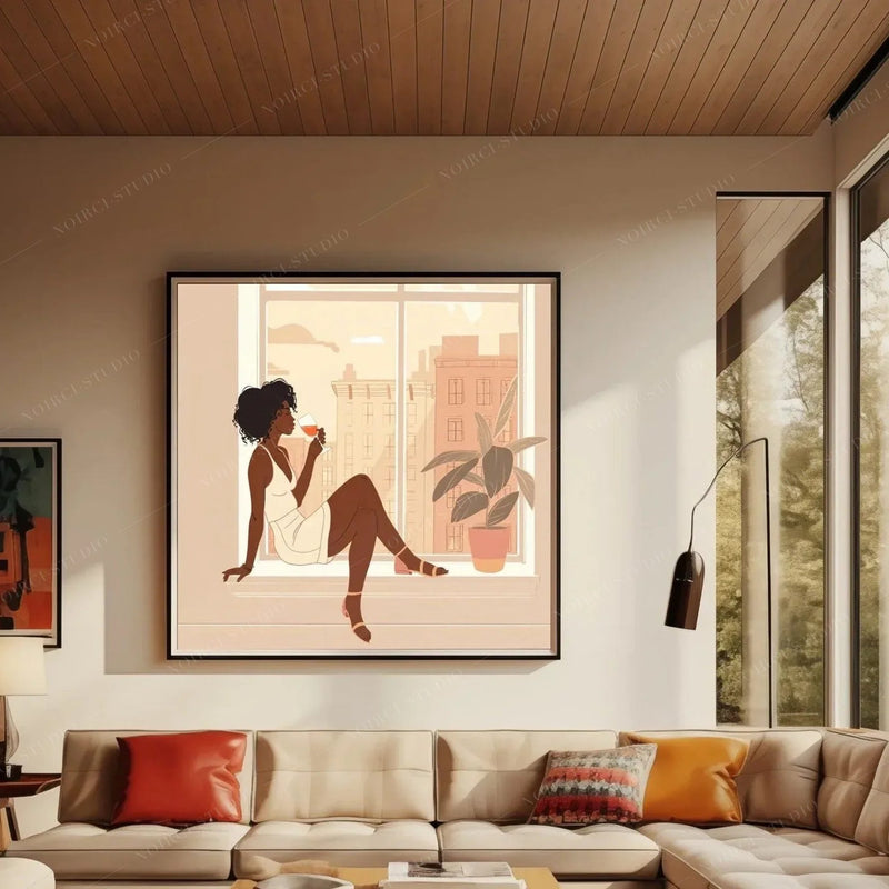 Black art for living room, mid-century space with a wood plank ceiling and beige sectional, woman with wine in a black frame