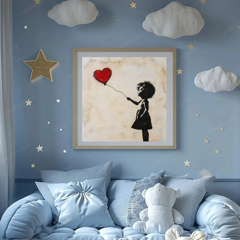 Black art for kids' rooms, girl with red balloon framed on a light blue wall with cloud and star decals