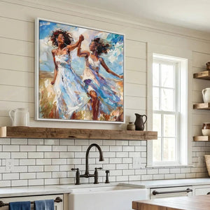 Black kitchen wall art above a farmhouse subway tile backsplash and wood shelf, women dancing in white sundresses