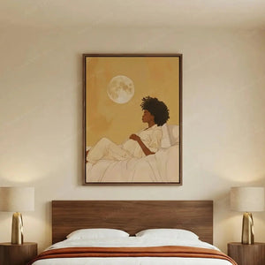 African American art for the bedroom, moon maternity canvas above a walnut platform bed with an orange throw