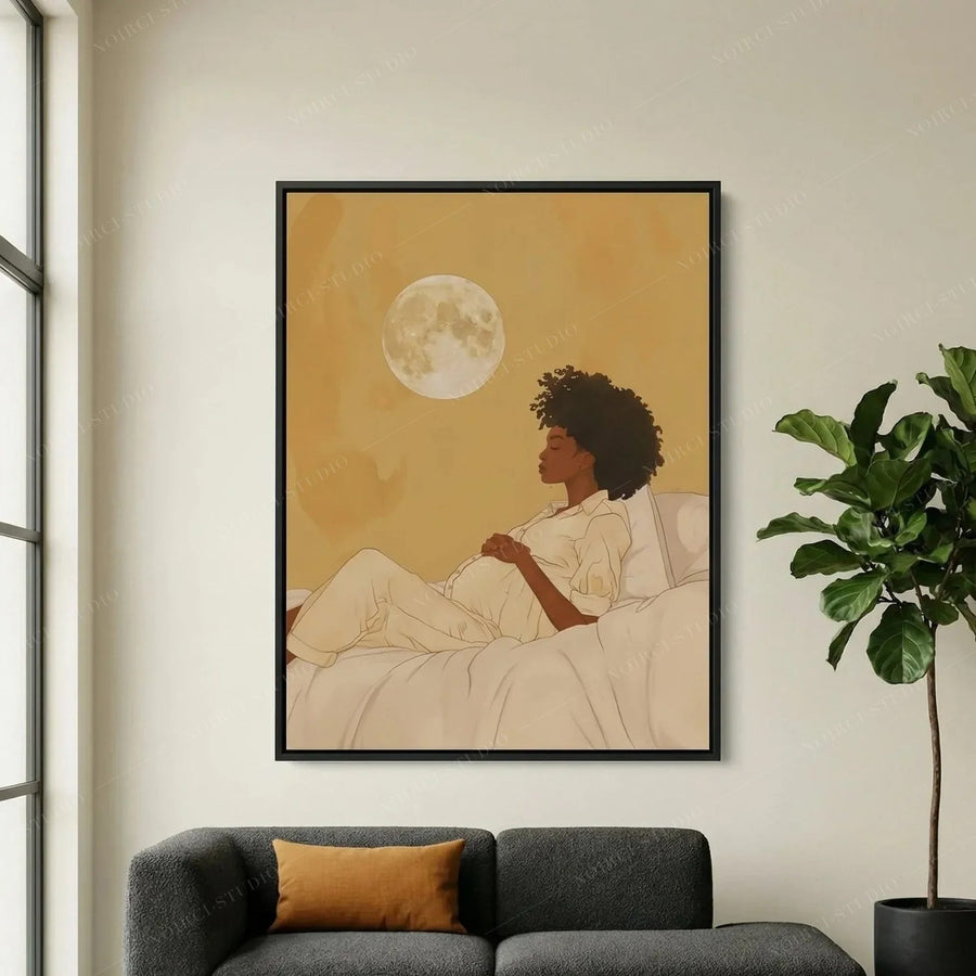 Modern African American art, expectant mother moon canvas above a charcoal sofa with mustard pillow and fiddle leaf fig
