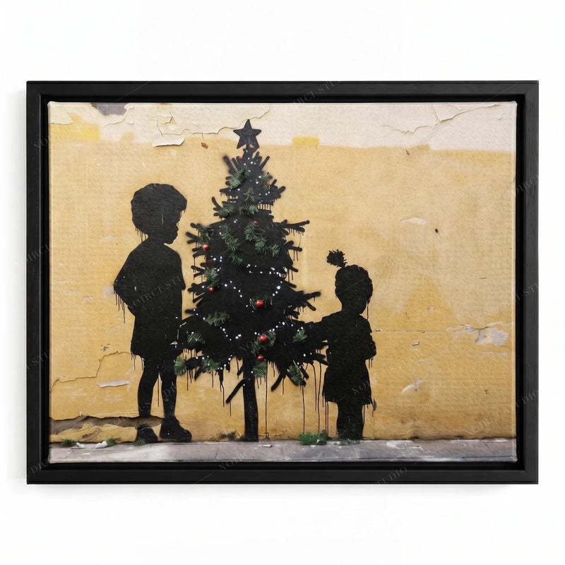 Black children Christmas canvas in a black floating frame, street-art stencil of two kids trimming a tree
