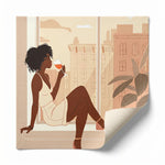 Rolled canvas print of a woman with wine on an urban windowsill, ready for custom framing