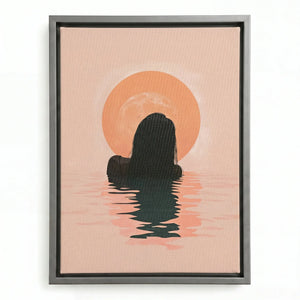 Minimalist Black art in a silver floating frame, woman wading toward the sunrise across rippled pink water