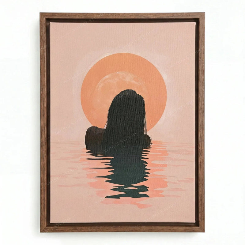 Boho sunrise canvas in a walnut floating frame, silhouette of a woman in still water beneath a soft orange sun