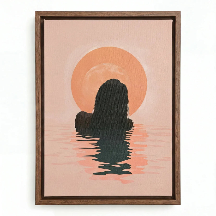 Boho sunrise canvas in a walnut floating frame, silhouette of a woman in still water beneath a soft orange sun